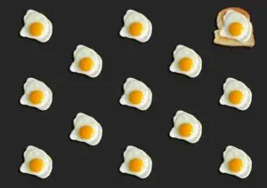 Cooked Eggs on Black Background